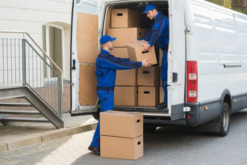 Professional movers handling furniture during a local Cudham move