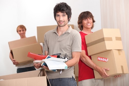 Staff preparing documents and equipment for an office move in Cudham