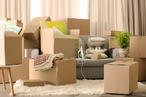 Local removal team transporting boxes and furniture in Cudham